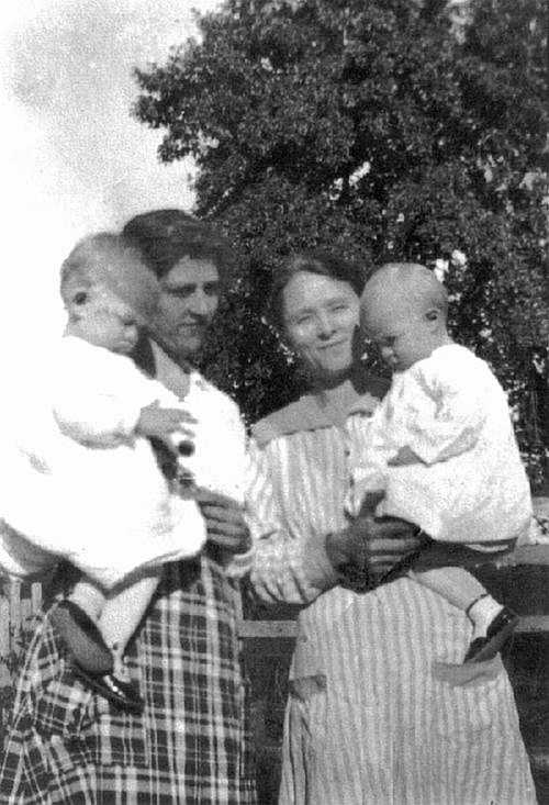 Harrelton Wooley and mother Birtiz Wooley, J. T. Wear and mother Ida Wear